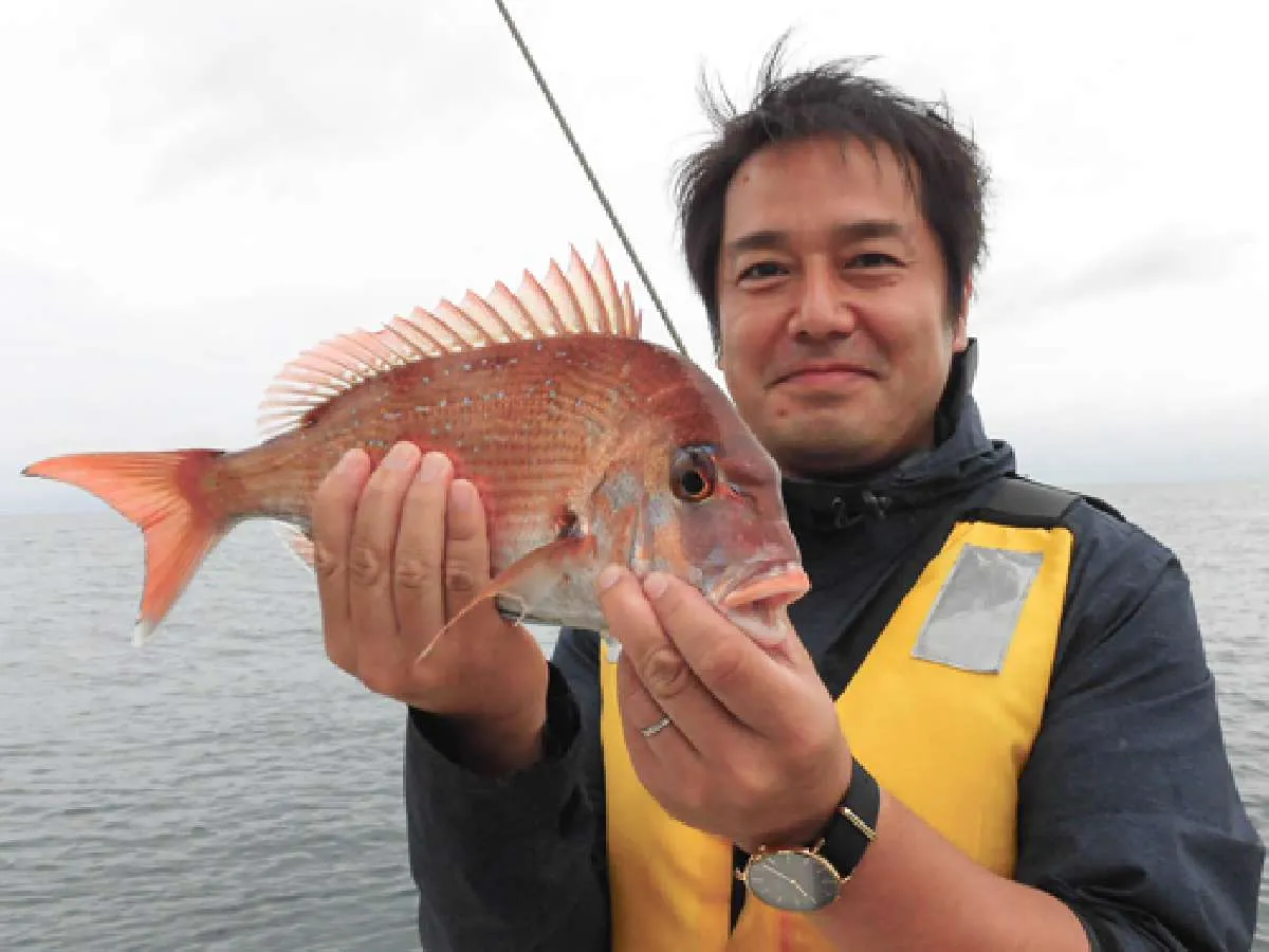 濱田さん、1匹目をゲットでこの笑顔！