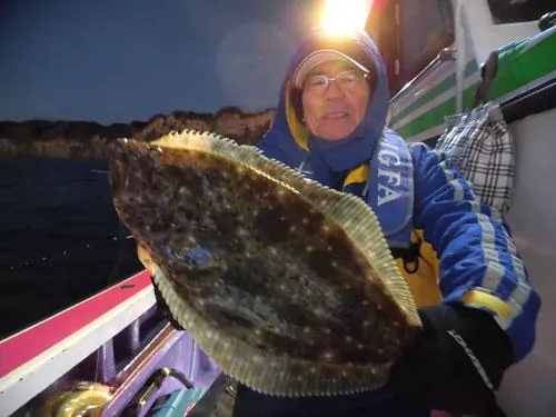 開始直後に釣れた1.5kg級のヒラメ