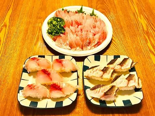 定番の刺身と寿司。炙りは粗塩でいただく。疲れた身体にイサキの甘みとビールが最高に染み渡った。これが釣り人の特権である。