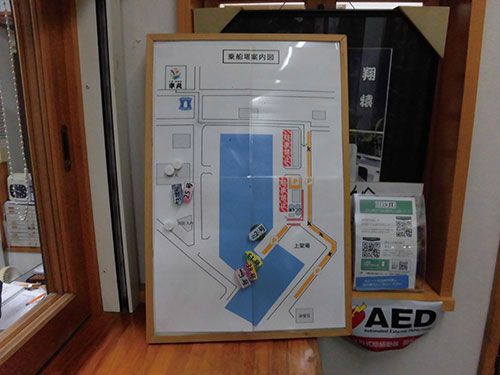 受け付け横の駐車場&船着場への地図